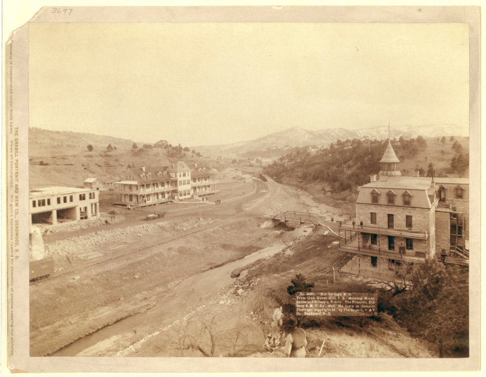 Hot Springs, S.D. From Club House Hill, S.E., showing Minnekahta and Gillespie Hotels. The Fremont, Elkhorn & M.V. Ry., with old town in distance LCCN99613864