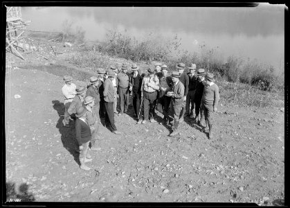 Informal group of Assistant Superintendents and Foremen at the Norris Dam site. In the background is the Clinch River. - NARA - 532719