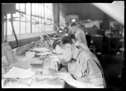 Ivor Steadman, Litz Manor, Kingsport, Tennessee. Steadman is shown here finishing and patching, an operation... - NARA - 532754