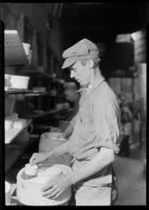 Mallard Hilton, a kiln placer in Southern Potteries, Elroy, Tennessee. Hilton came to work with the Potteries from a... - NARA - 532755