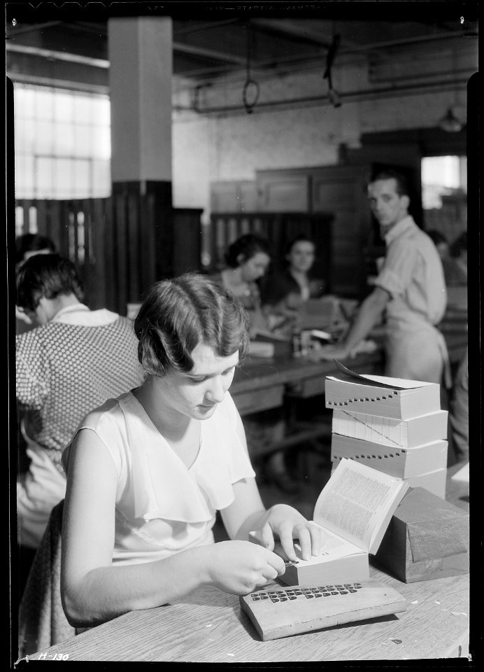 Ola Brooks, Mt. Carmel, Tennessee. This girl is placing index tabs. The tabs are applied with tweezers, and a... - NARA - 532748