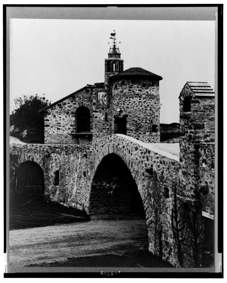 Surprise Valley Farm, Arthur Curtiss James property, Beacon Hill Road, Newport, Rhode Island. Archway with turret and weathervane in background LCCN00651311