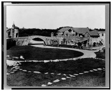 Surprise Valley Farm, Arthur Curtiss James property, Beacon Hill Road, Newport, Rhode Island. Courtyard with cattle being driven along pathway LCCN00651301