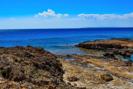 Seashore sky clouds photo