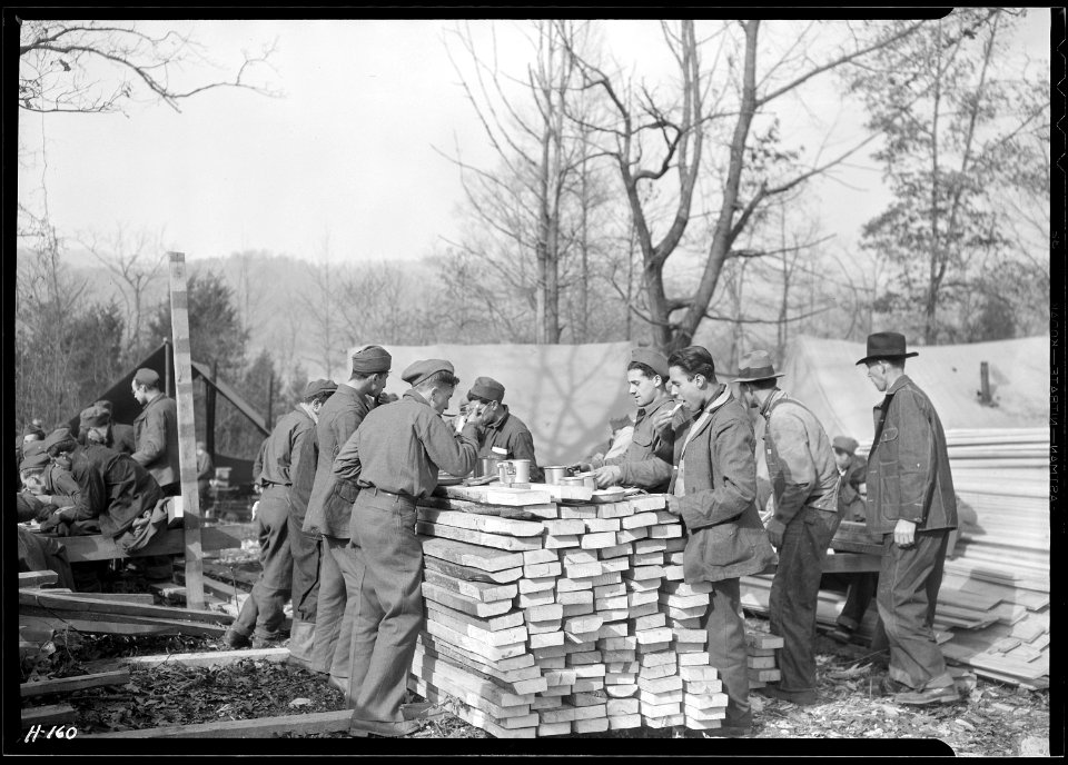 This `Counter Restaurant' is at CCC Camp, TVA ^22, near Esco, Tennessee. Temporarily the boys are eating outdoors... - NARA - 532778