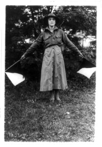 Wig wag girl of the Woman's Defense League in the camp near Washington, D.C. LCCN2004672290
