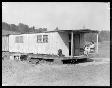 `Squatter's' home on Andersonville Road, Tennessee. The house is a made-over houseboat. - NARA - 532715