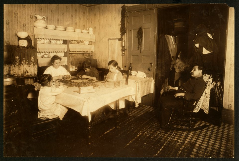 'Everybody works but--.' A common scene in the tenements. Father sits around. 'Sometime I make $9.00, sometime $10.00 a week on the railroad; sometime nottin'.' Helen, 5 years old, and LOC nclc.04089
