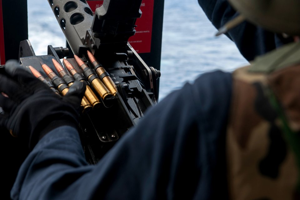 .50-caliber machine gun live-fire on USS Carl Vinson fantail 140925-N-HD510-099