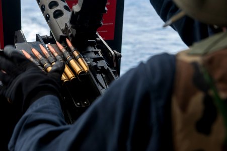 .50-caliber machine gun live-fire on USS Carl Vinson fantail 140925-N-HD510-099