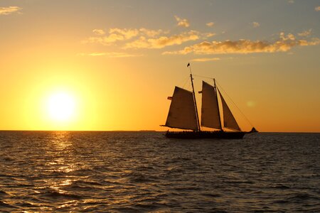 Ocean sailboat dusk photo