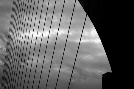 Black and white sky gray bridge photo