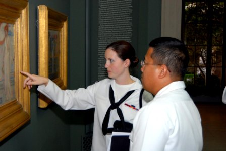 070530-N-6724S-019 - PO3 Sarah Enciso and CPO Dyrell Magaling look at artwork on display at the Smithsonian Museum's Asia exhibit