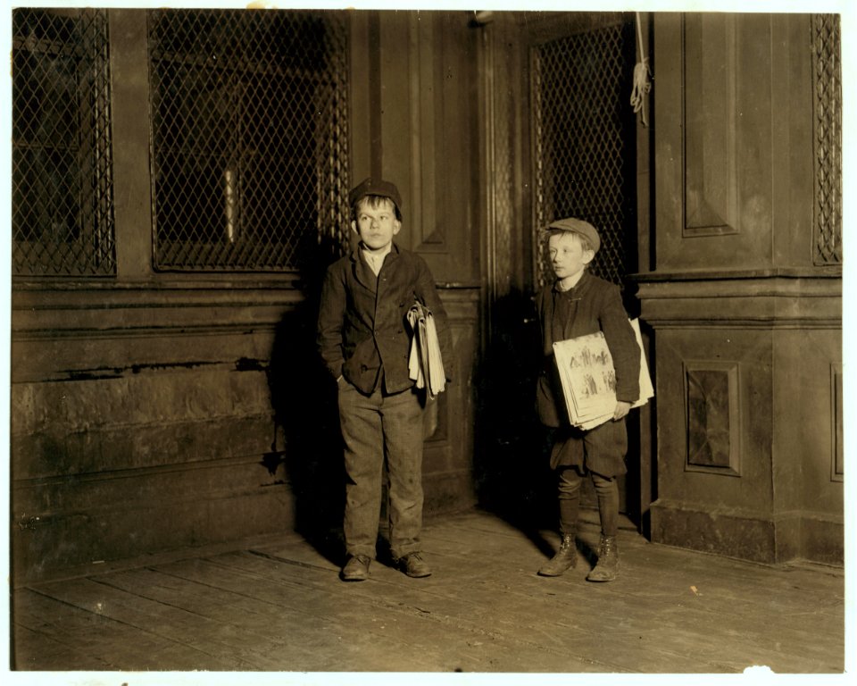 1-30 A.M. Peter, 15 years old (on left). Employed in camphor works. Air full of camphor. Sells papers Saturday nights until 3 A.M. One of a dozen boys who sleep in car barn these nights. LOC nclc.03798