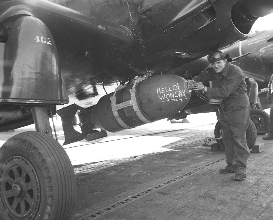 1,000 lb bomb on AD Skyraider of VF-54 on USS Essex (CV-9) c1952