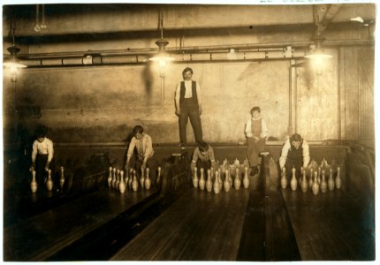 1-00 A.M. Pin boys working in Subway Bowling Alleys, 65 South St., B'klyn, N.Y. every night. 3 smaller boys were kept out of the photo by Boss. LOC cph.3a42470