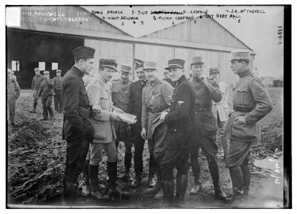 1. K. Rockwell, 2. Capt. Thenault, 3. Norman Prince, 4. Lieut. DeLaage, 5. Sgt. E, Cowdin, 6. Sgt. Bert Hall, 7. J.R. McConnell, and 8. Victor Chapman LCCN2014701921