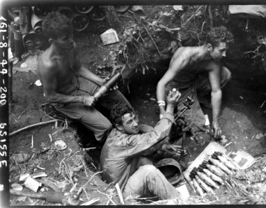 111-SC-190532 - Mortar crew of Co. B, 132nd Infantry, Americal Div. The company took part in the attack on Jap positions on Hill 260, Bougainville