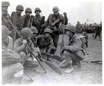 111-SC-368346 - Men of 35th Infantry Division receive instruction on river crossing in Holland, February 1945 photo