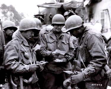 111-SC-337278 - Mail call for 70th Division Infantrymen who fought to retake the French town of Wingen after the Nazi counterattack gained control of the town. 781st Tank Battalion, 274th Infantry Regiment