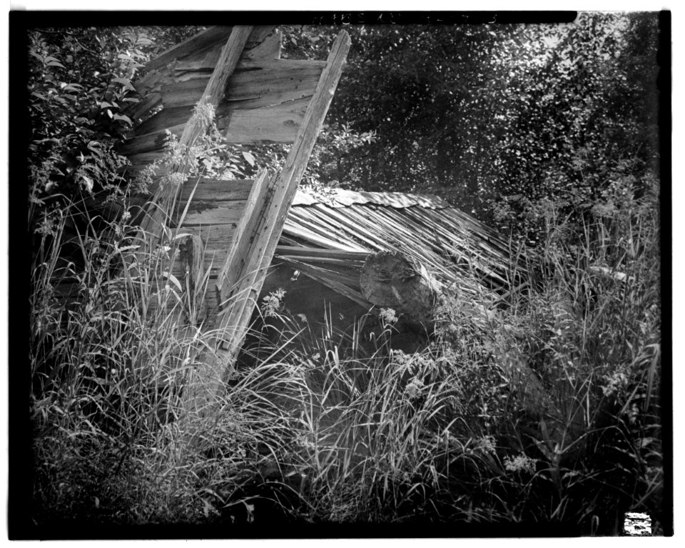 13. BLACKSMITH SHOP (BUILDING C) WEST WALL, ENTRY TO BUILDING - Dalton Trail Post, Mile 40, Haines Highway, Haines, Hai - LOC - hhh.ak0001.photos.001402p