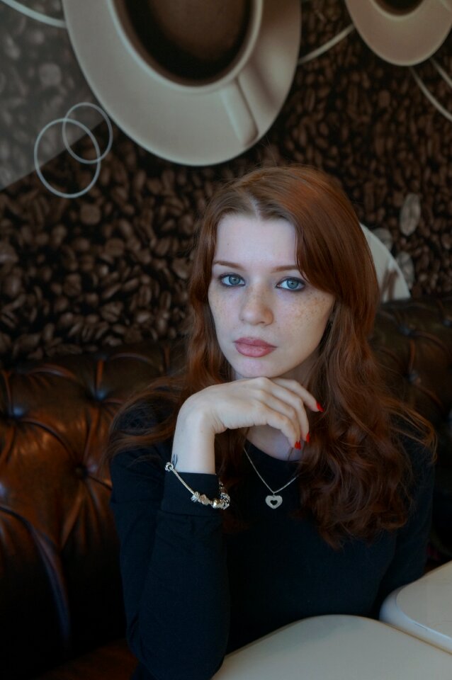 Portrait portrait of a girl coffee house