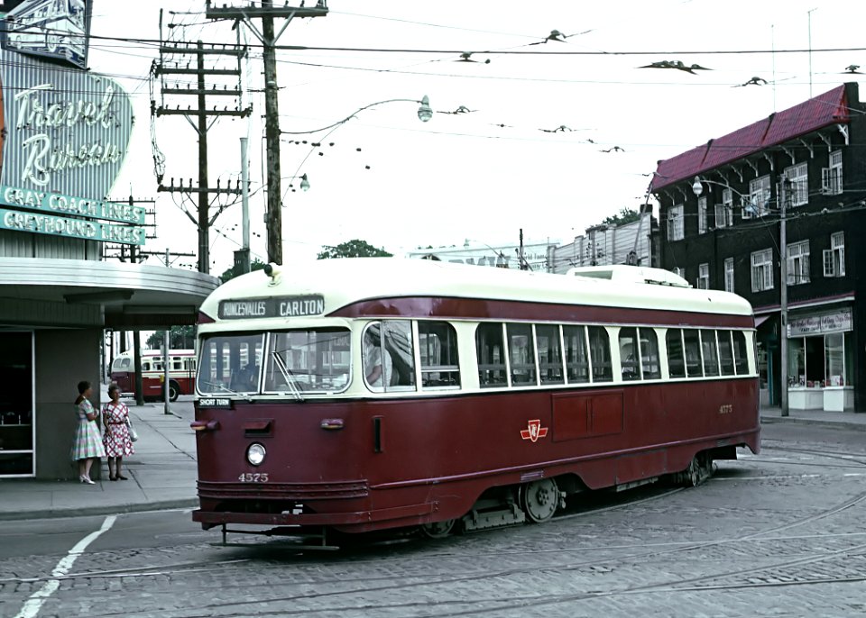 TTC 4575 (PCC) a RONCESVALLE CARLTON car turning on to Queensway from Roncesvalles Ave., in Toronto, ONT on July 4, 1966 (22395596929)