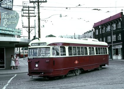 TTC 4575 (PCC) a RONCESVALLE CARLTON car turning on to Queensway from Roncesvalles Ave., in Toronto, ONT on July 4, 1966 (22395596929) photo