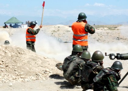 A group of Afghan National Army trainees wait while a Russian Recoilesss Rifle (SPG-9) is fired (4706047814)