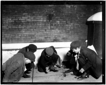 A group of Newsies playing craps in the jail alley at 10 P.M. Albany, N.Y. - NARA - 523280