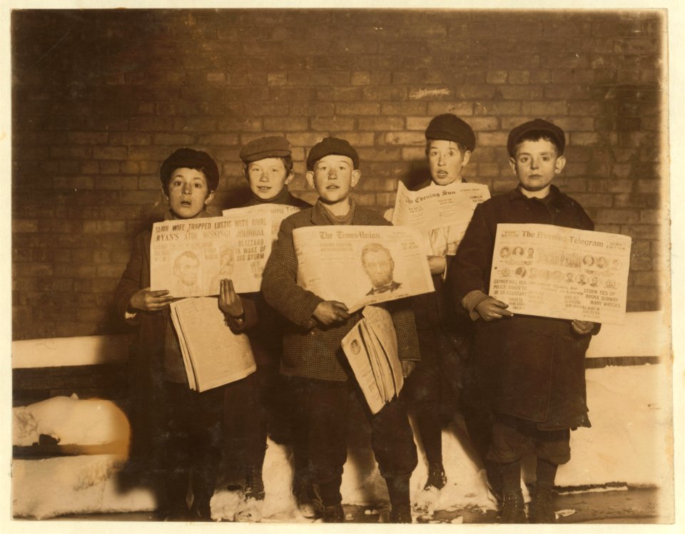 A group of newsies selling evenings in saloons and stores. Taken in alley back of City Jail at 10 P.M. Left to right- Dominick Mardilo, 28 1-2 Fulton Street; Roderick Towle, 44 Sheridan LOC cph.3a48510