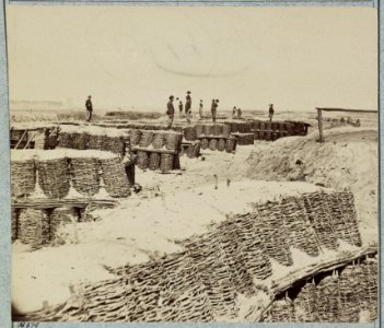 A group of soldiers stand on gabions used as fortifications near Petersburg, Virginia LCCN2012646262