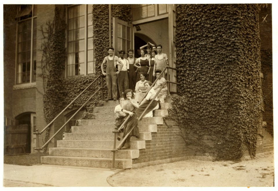 A group of workers in the Butler Mills. Kate McCormick, 10 Cleveland St. The smallest girl in the picture. Apparently 13 years old. The happy faces appear only when the photo is being taken. LOC nclc.02249