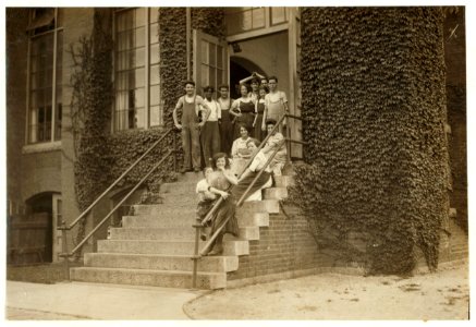 A group of workers in the Butler Mills. Kate McCormick, 10 Cleveland St. The smallest girl in the picture. Apparently 13 years old. The happy faces appear only when the photo is being taken. LOC nclc.02249