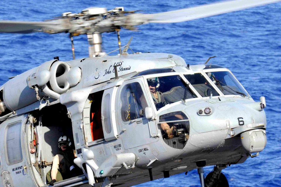 A helicopter drops off cargo. (8661308090)