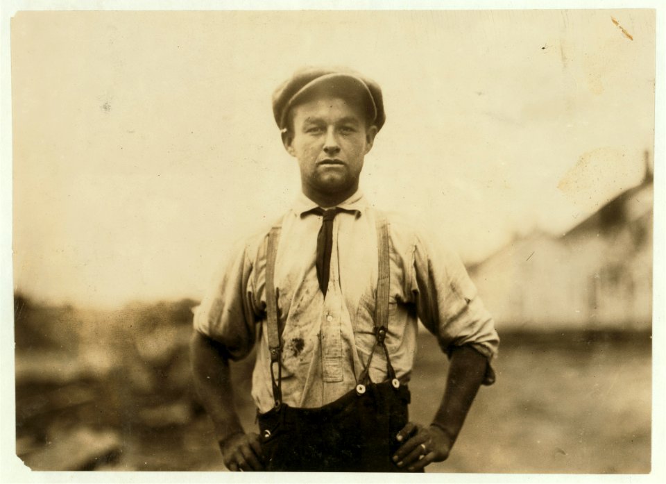 A husky tinsmith who works 8 hours a day, much of it out-doors. Compare him with some of our adolescent boys and girls who work in close confinement of the cotton mill 10 hours a day. LOC nclc.02626