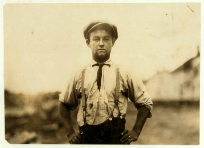 A husky tinsmith who works 8 hours a day, much of it out-doors. Compare him with some of our adolescent boys and girls who work in close confinement of the cotton mill 10 hours a day. LOC nclc.02626