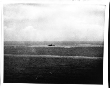 A Japanese Tone-class cruiser fires at attacking planes during the Battle off Samar