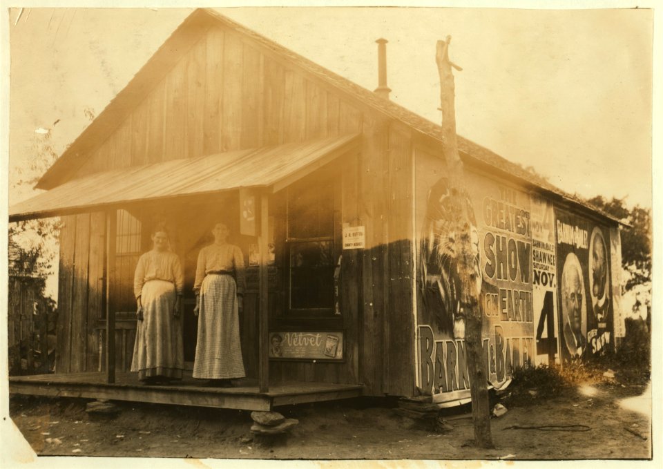 A little country store near New Hope School -41. Mrs. M.E. Geralds, P.O. Route 2, Tecumseh, Okla., is in charge; also a customer. Lewis W. Hine. See W.H. Swift Report. LOC cph.3a29796