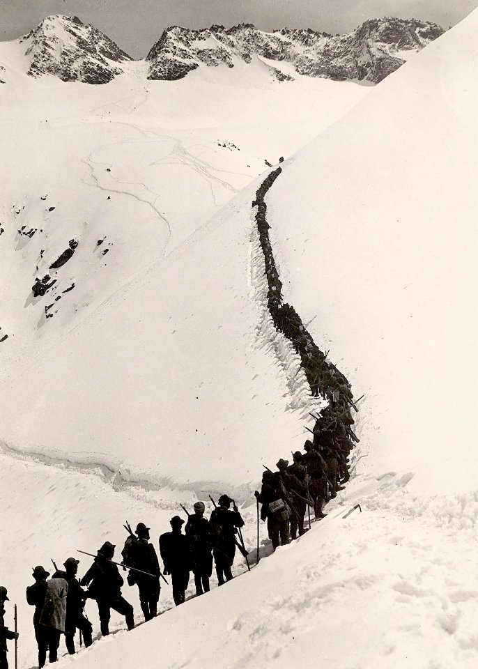 A line of Italian Alpine troops marches on Adamello 1916