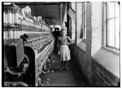 A little spinner in a Georgia Cotton Mill. LOC nclc.05403