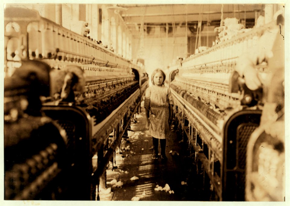 A little spinner in the Mollahan Mills, Newberry, S.C. She was tending her 'sides' like a veteran, but after I took the photo, the overseer came up and said in an apologetic tone that was LOC nclc.05382