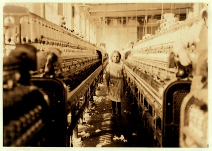 A little spinner in the Mollahan Mills, Newberry, S.C. She was tending her 'sides' like a veteran, but after I took the photo, the overseer came up and said in an apologetic tone that was LOC nclc.05382
