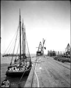 A lumber schooner, the Azalea Sanfrancisco, anchored at the Redondo Beach railroad and shipping wharf, ca.1904-1910 (CHS-5491)