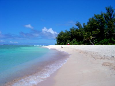 A magnificent white sand beach on Guam (line378129763)