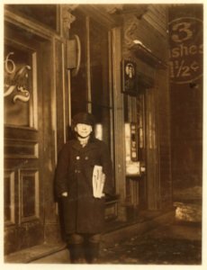 A lone newsie selling at 8 P.M. at the R. R. Station. Peter Fanella, 12 years old, 411 Catherine Street. LOC nclc.03433