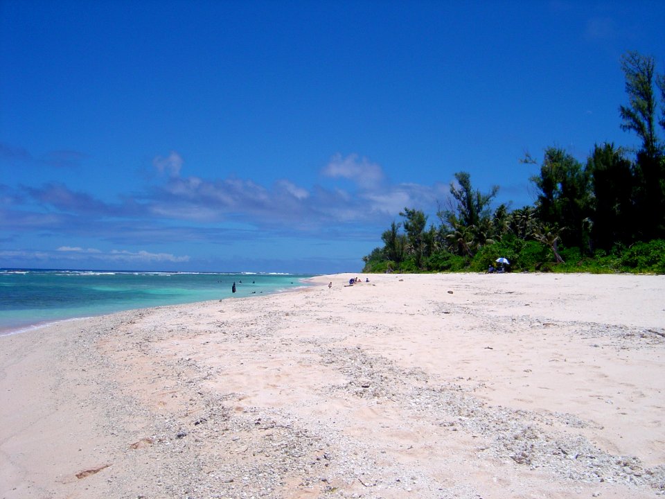 A magnificent white sand beach on Guam (line378229763)
