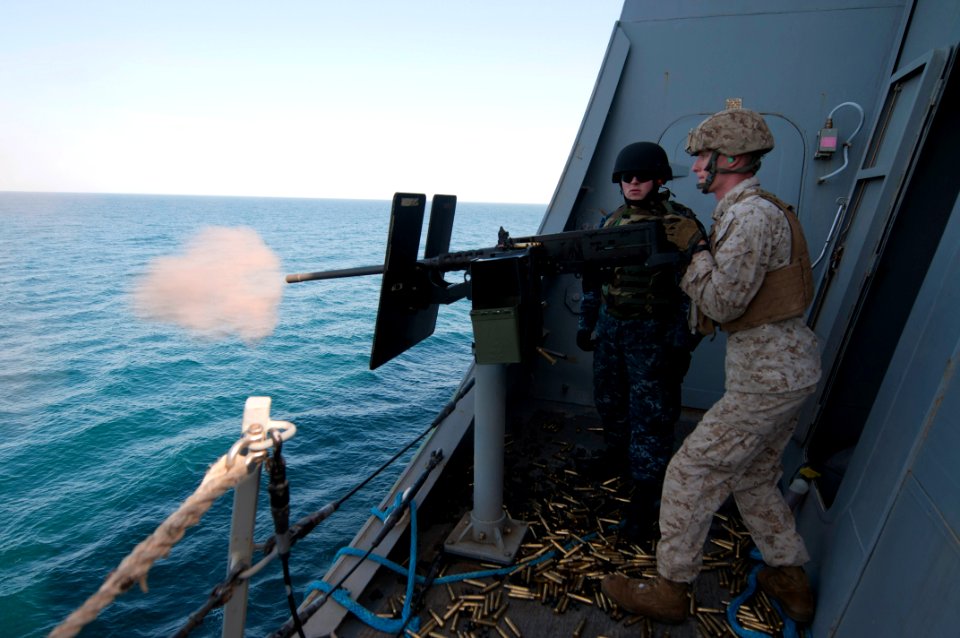 A Marine fires a .50-caliber machine gun. (6852046511)