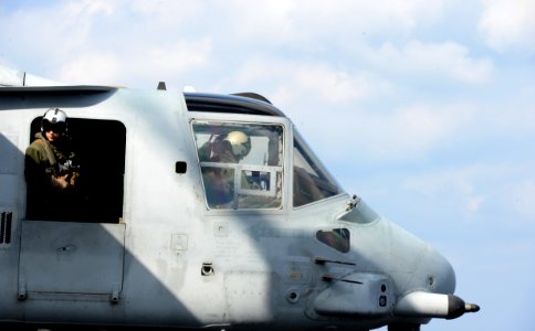 A Marine monitors the landing area from an MV-22. (8426064795)