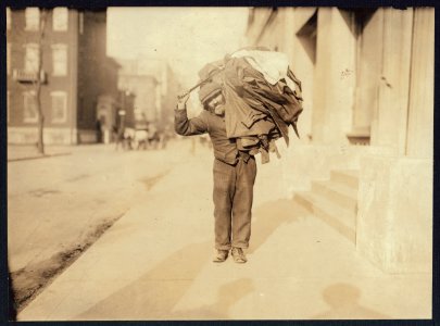 A modern Atlas. The Home-work Burden. Said he made button-holes at home. Washington Square, N.Y. LOC nclc.04184